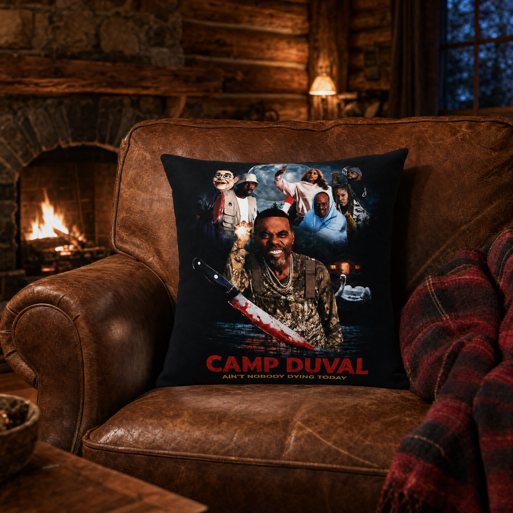 Camp Duval Key Art throw pillow on a leather armchair by the cabin fireplace — official movie merch